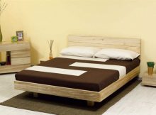 Letto in legno alla francese